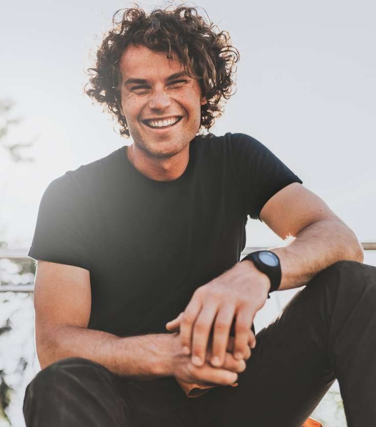A relaxed, smiling man